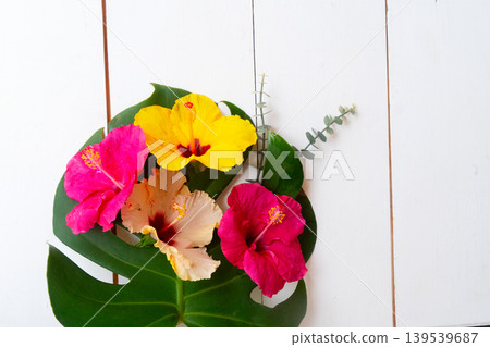 Tropical flowers and leaves, summer vacational background Tropical flowers and leaves, summer vacational background 139539687