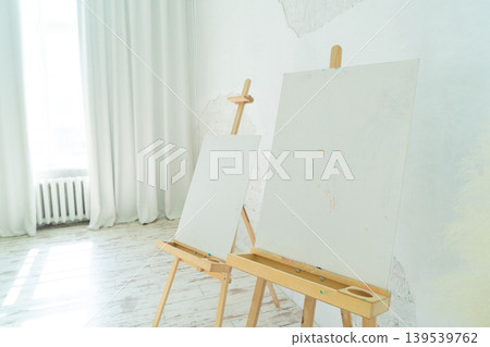 A Bright and Innovative Art Studio Featuring Beautiful Wooden Furniture along with Captivating Paintings A Bright and Innovative Art Studio Featuring Beautiful Wooden Furniture along with Captivating Paintings 139539762