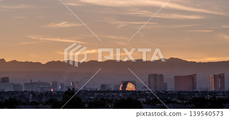 Las Vegas Nevada Skyline with Stratosphere Tower and Desert Mountain Backdrop Las Vegas Nevada Skyline with Stratosphere Tower and Desert Mountain Backdrop 139540573