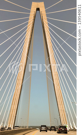 Driving Across Arthur Ravenel Bridge Beneath Massive Suspension Cable Structure Driving Across Arthur Ravenel Bridge Beneath Massive Suspension Cable Structure 139540611