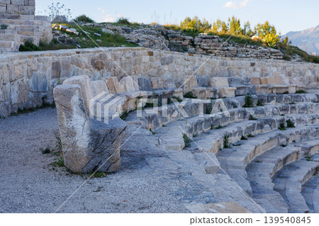 Ancient stone theater seating in a weathered archaeological site Ancient stone theater seating in a weathered archaeological site 139540845