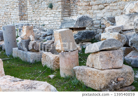 Ancient stone ruins with weathered architectural fragments and blocks Ancient stone ruins with weathered architectural fragments and blocks 139540859