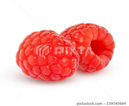 Two red berries isolated. Ripe raspberry with clipping path. Two red berries isolated. Ripe raspberry with clipping path. 139540994