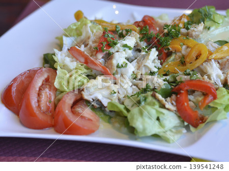 Salad with fish green salad rice and tomatoes Salad with fish green salad rice and tomatoes 139541248