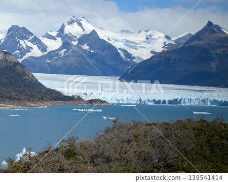 A view of the Andes mountain peaks and the Perito Moreno Glacier in Santa Cruz Province, Argentina. A view of the Andes mountain peaks and the Perito Moreno Glacier in Santa Cruz Province, Argentina. 139541414