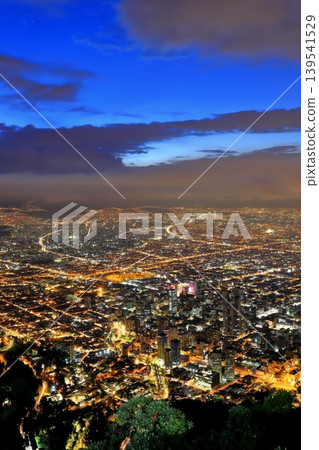 The night view of Bogotá, one of South America's largest cities: a carpet of lights and main roads seen from a hilltop. The night view of Bogotá, one of South America's largest cities: a carpet of lights and main roads seen from a hilltop. 139541529
