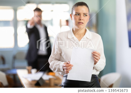 Male boss yells and throws an errant employee out of office Male boss yells and throws an errant employee out of office 139541673