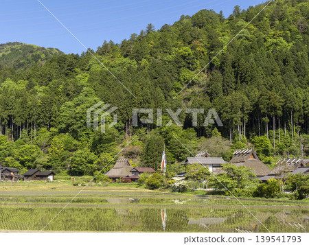 Thatched-roof old houses and rice paddies in Miyama Kayabuki no Sato (Miyama Thatched Village) Thatched-roof old houses and rice paddies in Miyama Kayabuki no Sato (Miyama Thatched Village) 139541793