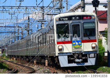 Keio 7000 series 7728F with a restored maroon stripe and Jinba headmark running with Mount Fuji in the background. Keio 7000 series 7728F with a restored maroon stripe and Jinba headmark running with Mount Fuji in the background. 139541838