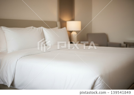 Clean white bed in a modern hotel room Clean white bed in a modern hotel room 139541849