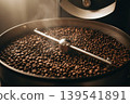Freshly roasted coffee beans in a coffee roaster 139541891