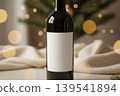 Dark wine bottle with blank label and festive bokeh lights 139541894