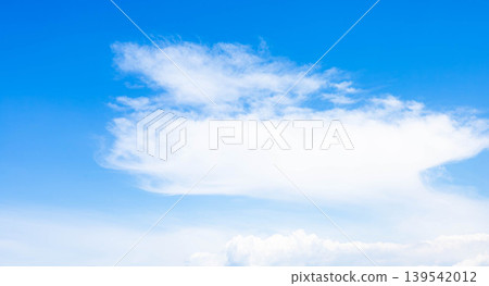 A refreshing summer scene with a clear blue sky and white clouds. A refreshing summer scene with a clear blue sky and white clouds. 139542012