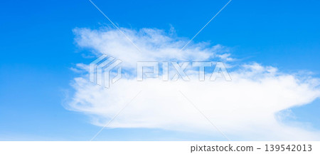 A refreshing summer scene with a clear blue sky and white clouds. A refreshing summer scene with a clear blue sky and white clouds. 139542013