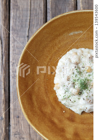 Chicken and chickpea cream risotto Chicken and chickpea cream risotto 139543600
