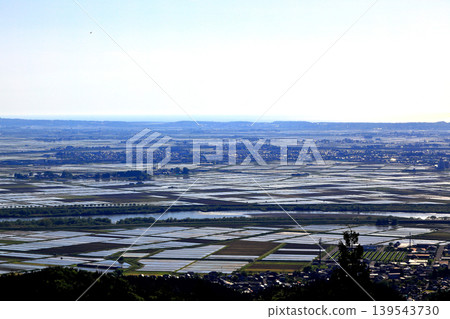 Chokai Forest, Shonai Plain in early May, rice paddies and settlements 139543730