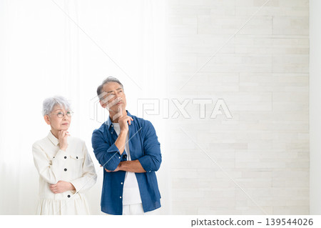 Woman and man standing side by side Lifestyle image Woman and man standing side by side Lifestyle image 139544026