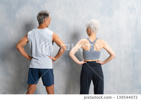 Senior men and women in training wear Sports image Senior men and women in training wear Sports image 139544072
