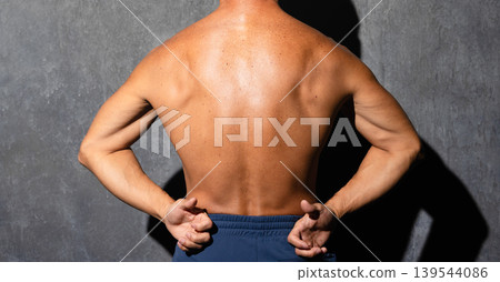 Senior man posing shirtless in bodybuilding poses Sports image Senior man posing shirtless in bodybuilding poses Sports image 139544086