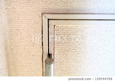 Gaps, seams, and peeling of vinyl wallpaper. Gaps, seams, and peeling of vinyl wallpaper. 139544708