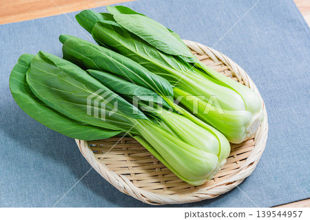 Fresh bok choy served on a sieve 139544957