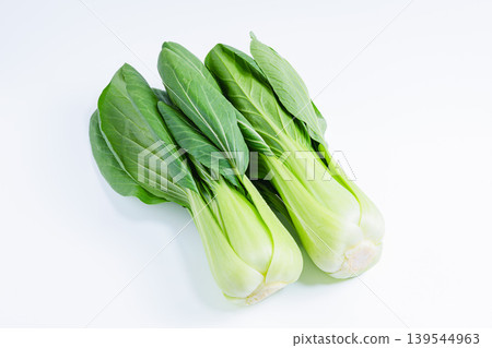 Photo of bok choy against a white background. Fresh bok choy vegetable material. Photo of bok choy against a white background. Fresh bok choy vegetable material. 139544963