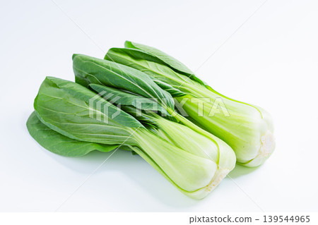 Photo of bok choy against a white background. Fresh bok choy vegetable material. 139544965