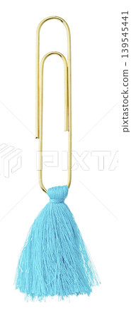 Gold paper clips + cyan blue tassels, gray background studio shoot Gold paper clips + cyan blue tassels, gray background studio shoot 139545441