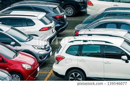 Car parked at parking lot of the airport for rental. Aerial view of car parking lot of the airport. Used luxury car for sale and rental service. Automobile parking space. Car dealership concept. Car parked at parking lot of the airport for rental. Aerial view of car parking lot of the airport. Used luxury car for sale and rental service. Automobile parking space. Car dealership concept. 139546077