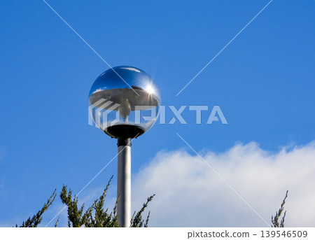 Blue sky and round streetlight Blue sky and round streetlight 139546509