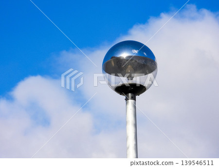 Blue sky and round streetlight 139546511