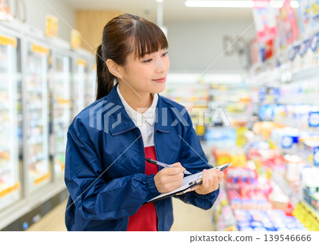 Female working in a supermarket Female working in a supermarket 139546666