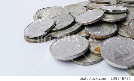 Stack of 100 and 200 Rupiah Coins on White Background Stack of 100 and 200 Rupiah Coins on White Background 139546785