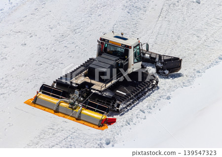 Snowcat, machine for snow removal, preparation ski trails, snow groomer Snowcat, machine for snow removal, preparation ski trails, snow groomer 139547323