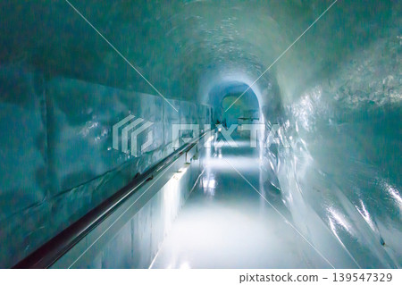 Ice tunnel in Ice Palace of Jungfraujoch Station in Switzerland Ice tunnel in Ice Palace of Jungfraujoch Station in Switzerland 139547329