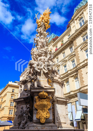 The Plague Column, or Trinity Column, is a Holy Trinity column located on the Graben, a street in the inner city of Vienna, Austria The Plague Column, or Trinity Column, is a Holy Trinity column located on the Graben, a street in the inner city of Vienna, Austria 139547358
