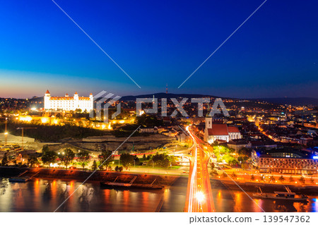 View of Bratislava castle, old town and the Danube river from observation deck the bridge in Bratislava, Slovakia at night View of Bratislava castle, old town and the Danube river from observation deck the bridge in Bratislava, Slovakia at night 139547362