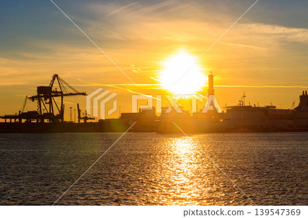 View of Lanterna (lighthouse) in the old port of the city of Genoa at sunset, Italy View of Lanterna (lighthouse) in the old port of the city of Genoa at sunset, Italy 139547369