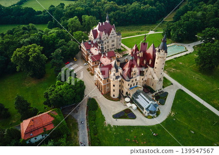 Aerial view of Moszna Castle surrounded by park in Poland Aerial view of Moszna Castle surrounded by park in Poland 139547567