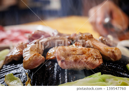 Perfectly cooked raw lamb shoulder loin Perfectly cooked raw lamb shoulder loin 139547760