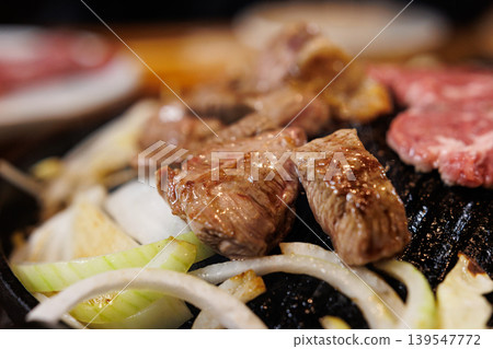 Raw lamb on a hot pot, ready to eat. 139547772
