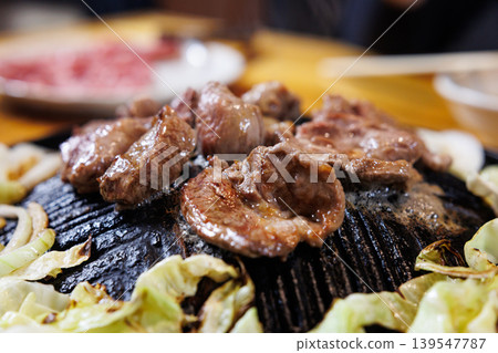 Freshly cooked, piping hot Genghis Khan (grilled lamb) Freshly cooked, piping hot Genghis Khan (grilled lamb) 139547787