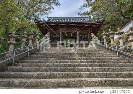 The stone steps and gate of the approach to Oosake Shrine at Akahosaka Pass The stone steps and gate of the approach to Oosake Shrine at Akahosaka Pass 139547995