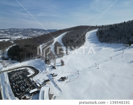 Aerial view of the snowy landscape at Rock Valley Ski Resort in Engaru Town, Hokkaido. Aerial view of the snowy landscape at Rock Valley Ski Resort in Engaru Town, Hokkaido. 139548191