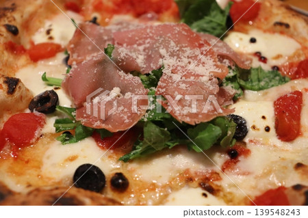 Pizza, prosciutto, olives, tomatoes, Parmesan cheese, restaurant, sauce, Italian cuisine 139548243