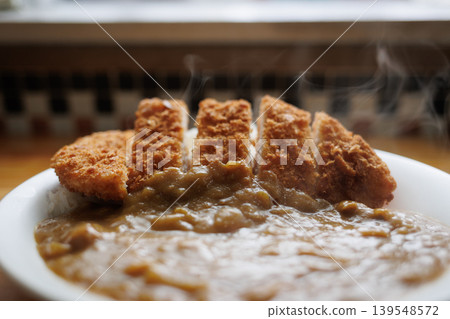 Piping hot, steaming chicken cutlet curry Piping hot, steaming chicken cutlet curry 139548572