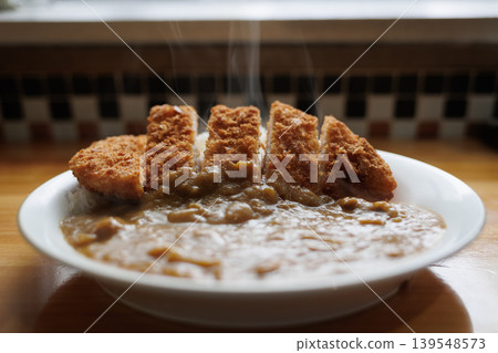 Freshly made, steaming chicken cutlet curry Freshly made, steaming chicken cutlet curry 139548573