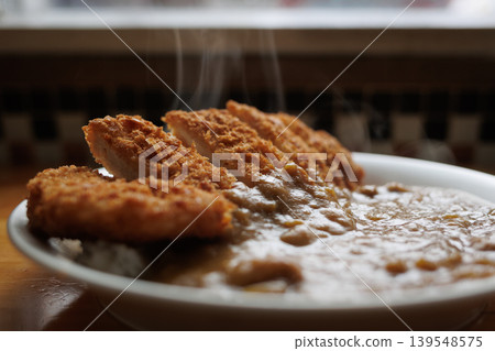 Freshly made, steaming chicken cutlet curry Freshly made, steaming chicken cutlet curry 139548575