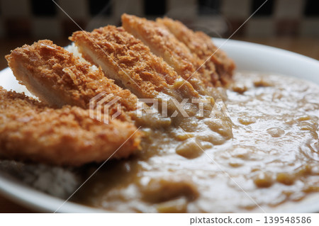 Close-up of katsu curry from a soba restaurant. Close-up of katsu curry from a soba restaurant. 139548586