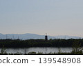 一座五層寶塔、一座風車和一座鋼塔。 139548908